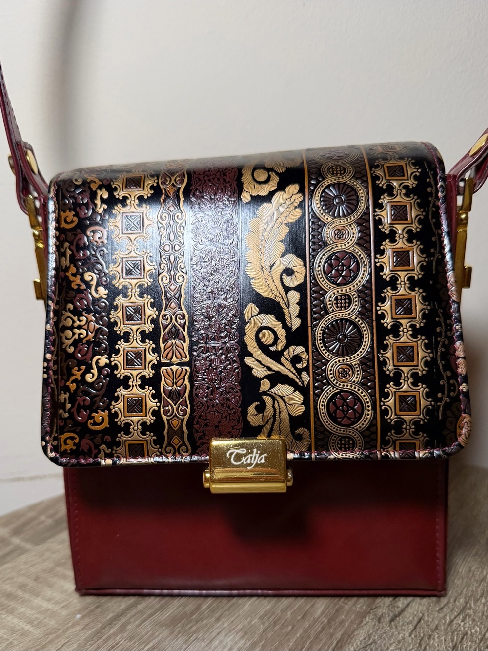 Ornate Burgundy gold and Black Embossed Shoulder Bag. Calja